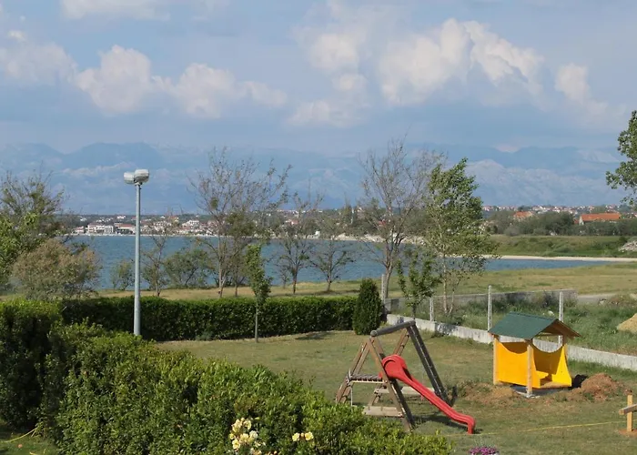 Апартаменты Family-friendly With Swimming Pool Nin, Zadar - 6560 Нин